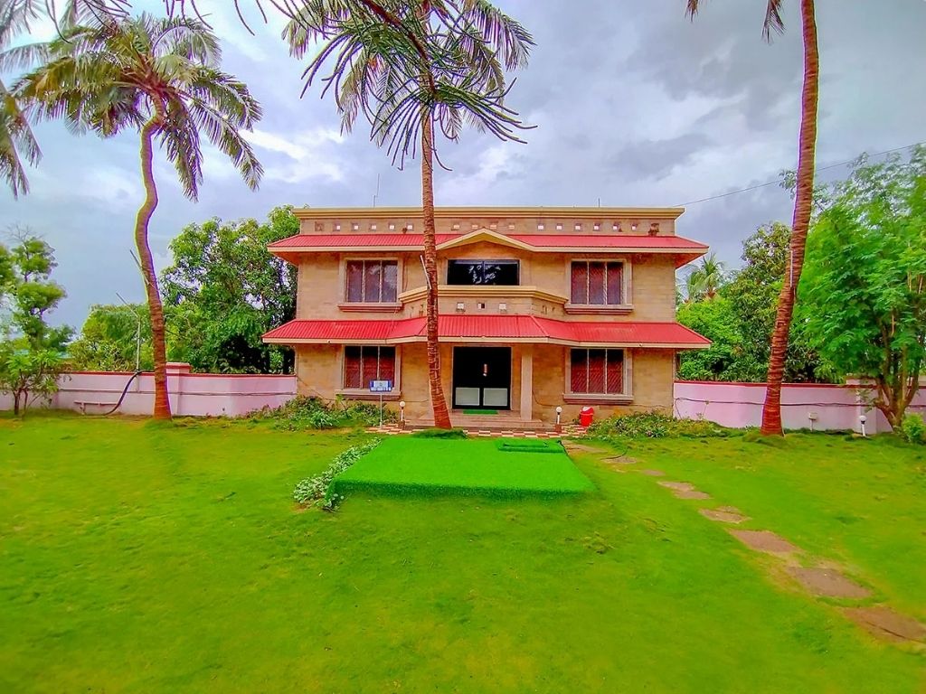 Image of Ac Deluxe Room at StayGuru Resort Farm Villa